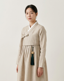Pumpkin Knot Norigae Monochrome – Charcoal, Against Dark Fabric | PEUM Korean Houseware